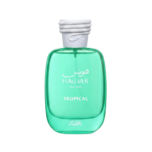 Green perfume bottle with white cap labeled 'Hawas Tropical' on a white background